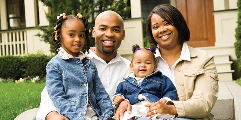 Family On House Steps | Crown Carpet, Inc. | Sun city west, Az